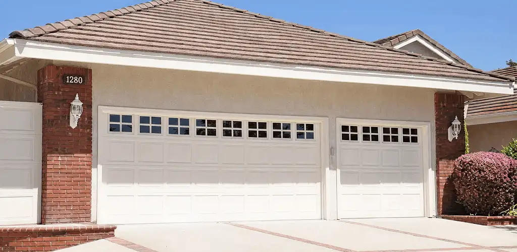 Residential garage door repair service for a double garage door in Providence, RI