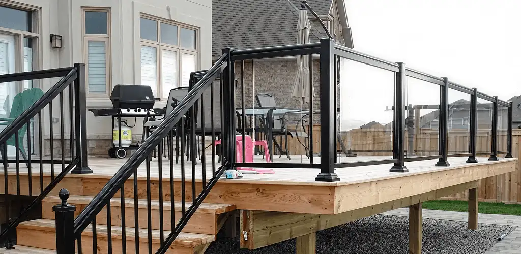Handrail installation on a deck staircase for safety and code compliance in Providence, RI